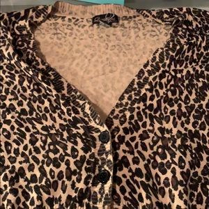 Leopard Print button up blouse.